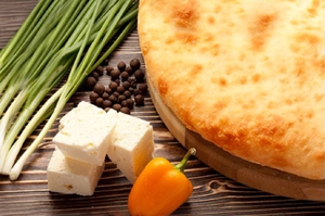 Осетинский пирог с сыром и зеленым луком